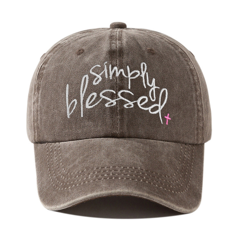 Brown washed baseball cap with embroidered "Simply Blessed" script
