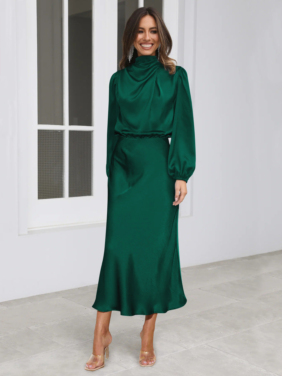 Green long-sleeved satin midi dress with high neck and puff sleeves