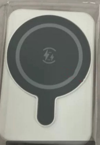 White magnetic wireless power bank with dark circular charging icon