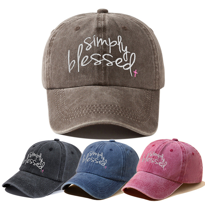 Dark gray washed baseball cap with embroidered "Simply Blessed" script