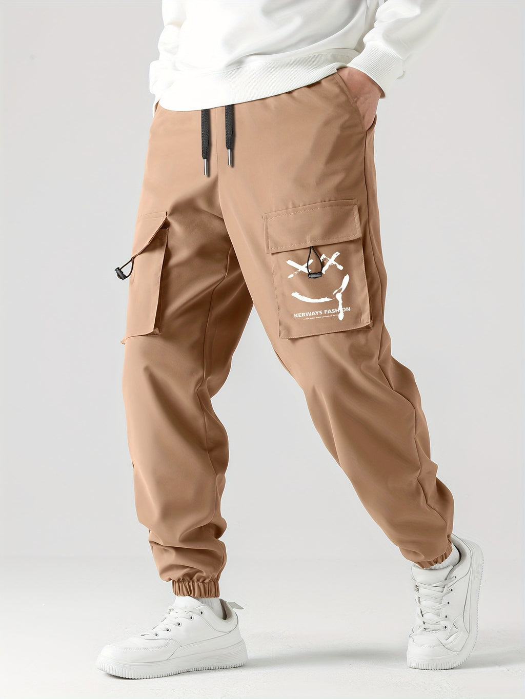 Khaki straight-leg overalls pants with ankle tie cuffs and cargo pockets