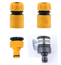 High-pressure foam spray gun with orange/yellow body and black nozzle, clear cup
