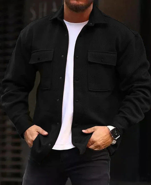 Men's polo-collar coat shirt in black with button front and flap chest pockets.