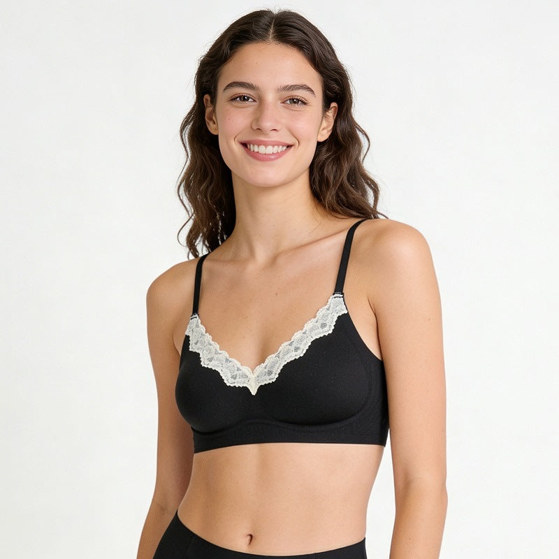 V-neck lace seamless bra, black cups with white lace V-neck trim, front view