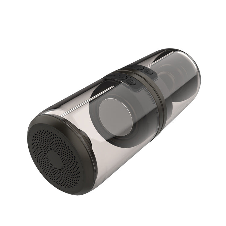 Portable Bluetooth speaker with transparent cylindrical body and black control panel