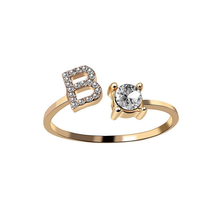 Adjustable initial letter ring with round clear stone, gold-tone pave B-shaped letter