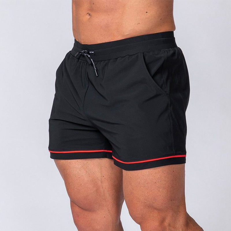 Quick-drying sport running shorts in black, elastic waistband with drawstring and red stripe hem