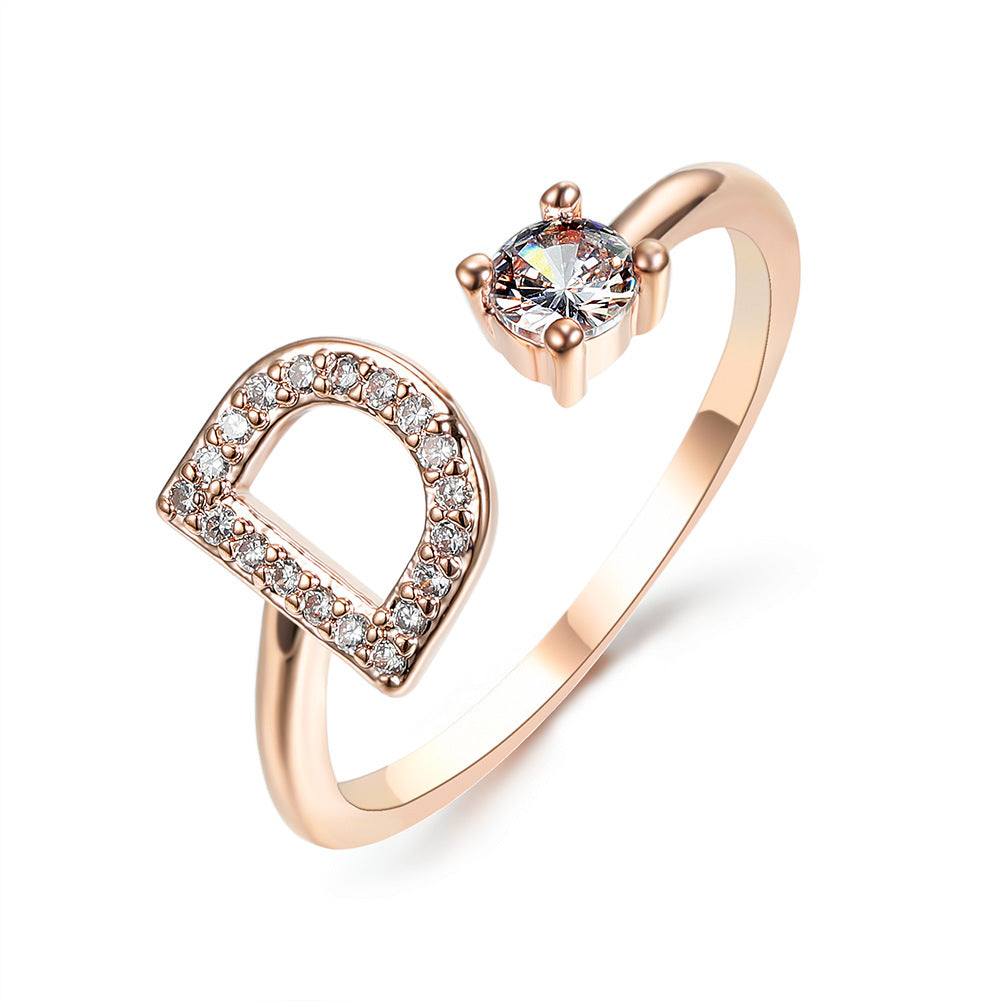 Rose gold initial D ring with round crystal center and pave D detail