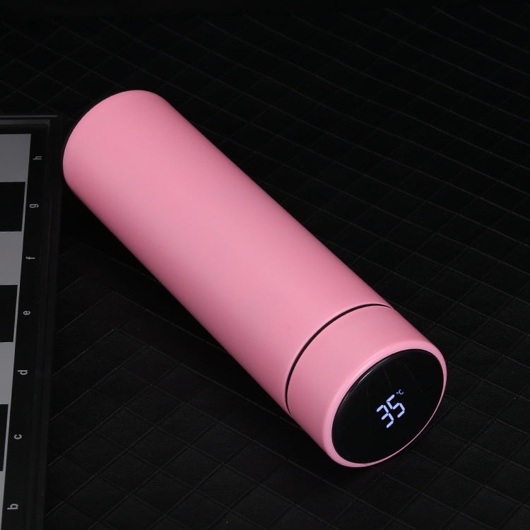 Pink 500ml smart vacuum bottle with black LED temperature display reading 35°C