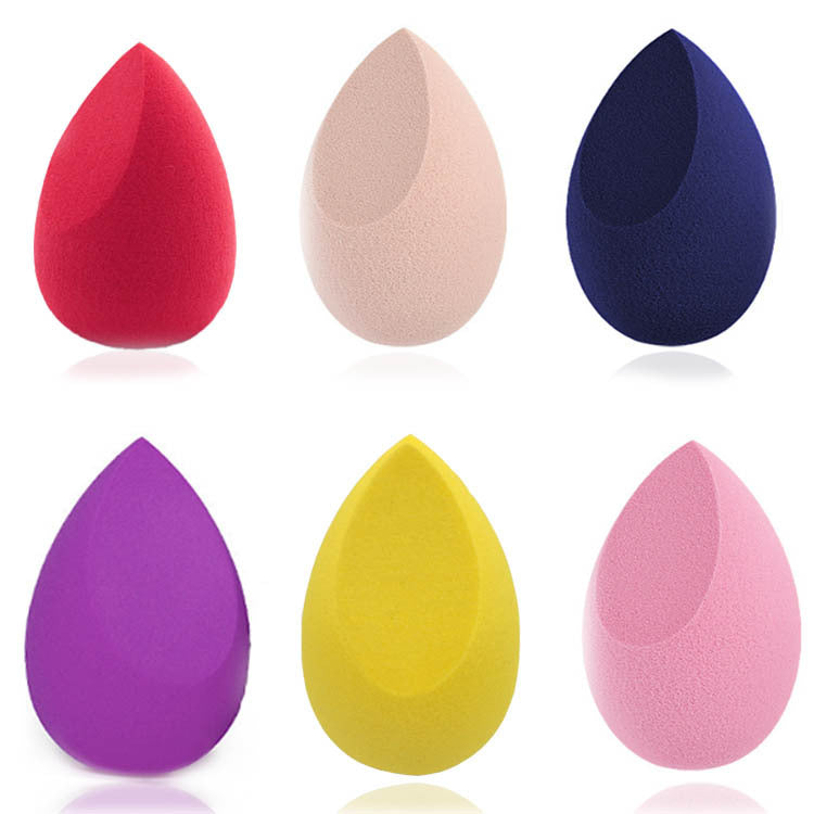 Teardrop makeup sponges in mixed colors, red, nude, navy, purple, yellow, and pink