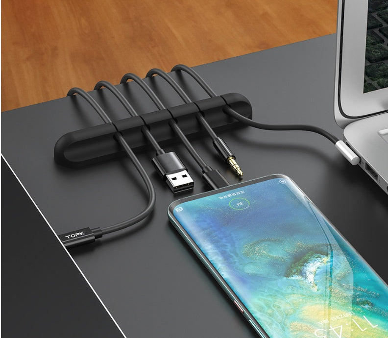 Silicone cable organizer clip bar holding charging cables, black