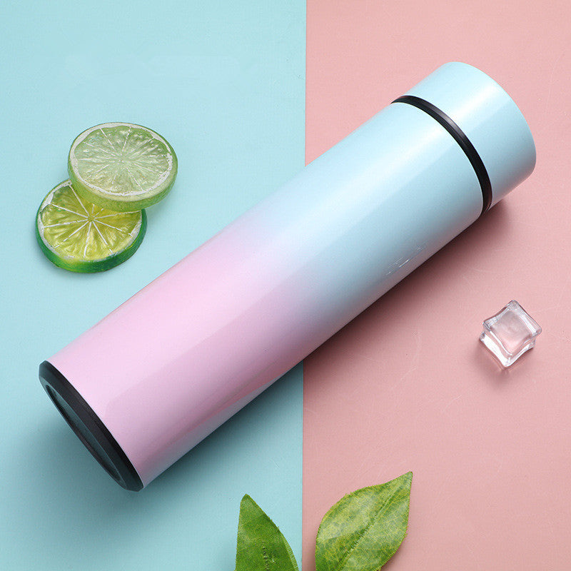 Vacuum insulated stainless steel bottle cup, pink to light blue gradient with black rim and lid