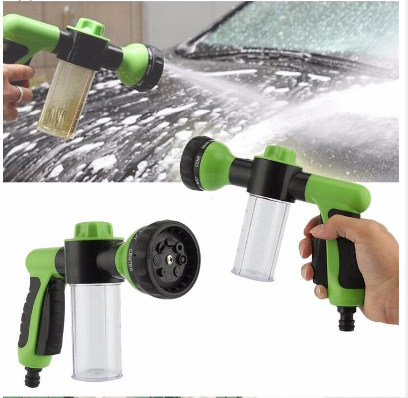 Green and black foam spray gun with clear bottle container for car washing