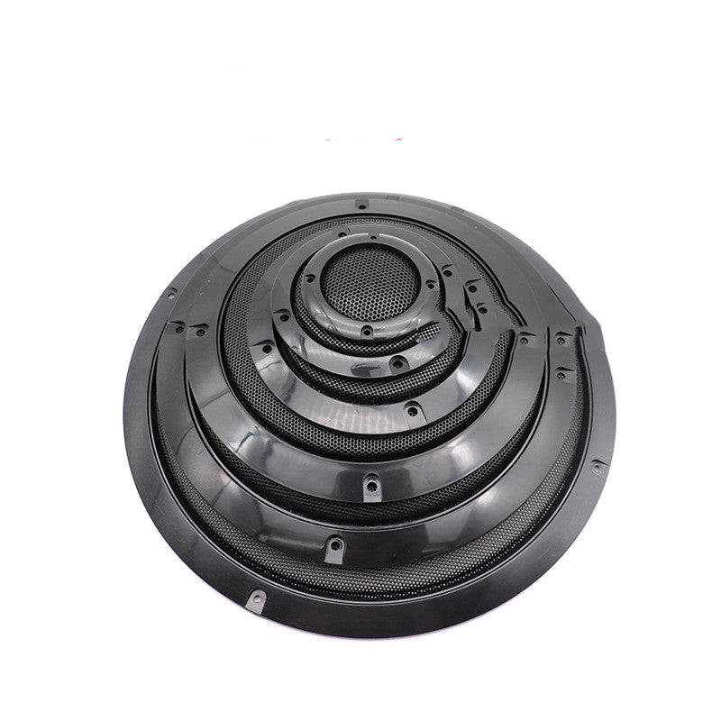 Car speaker grille mask with round black housing, mesh screen, and mounting tabs.
