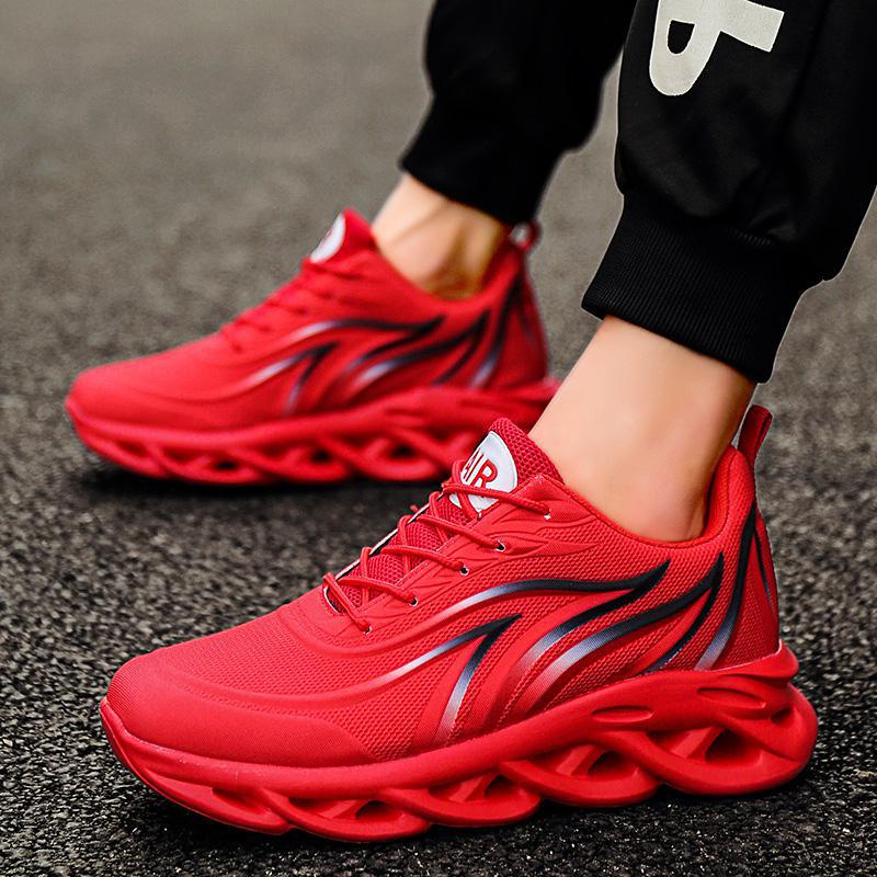 Red lace-up running shoes with dark stripe detail and chunky rubber sole