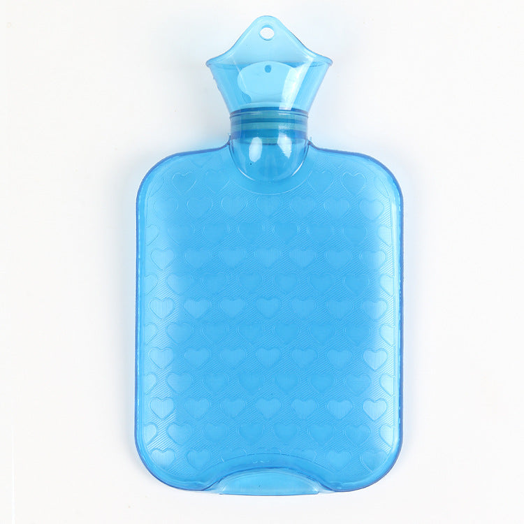 Blue hot water bottle with textured heart pattern and neck stopper