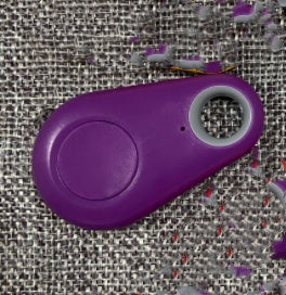 Purple Bluetooth anti-lost key finder fob with hanging loop.