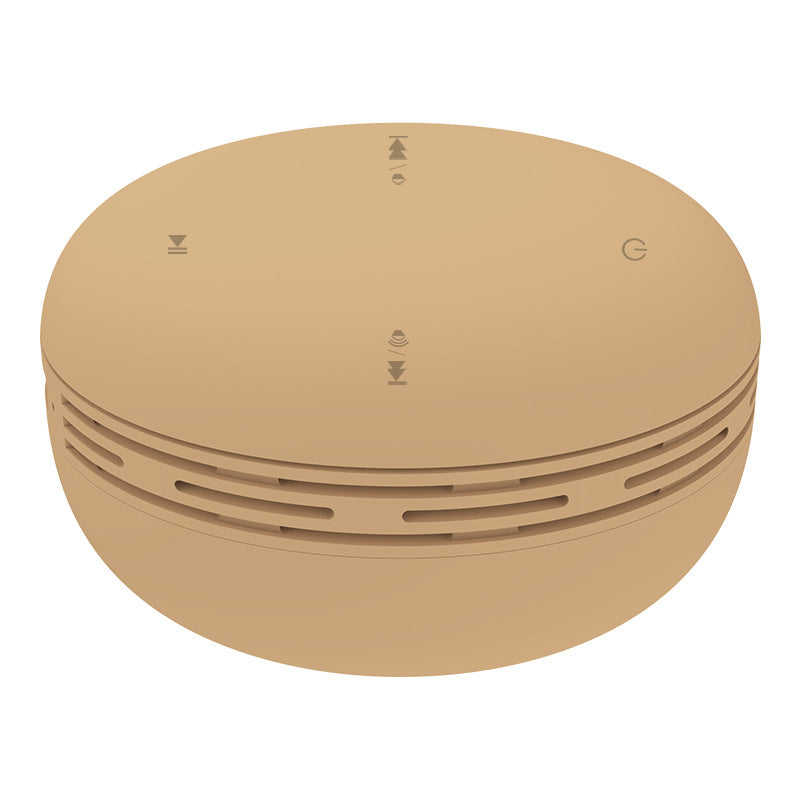 Mini Bluetooth speaker, earth beige round design with vented side ring and top control icons