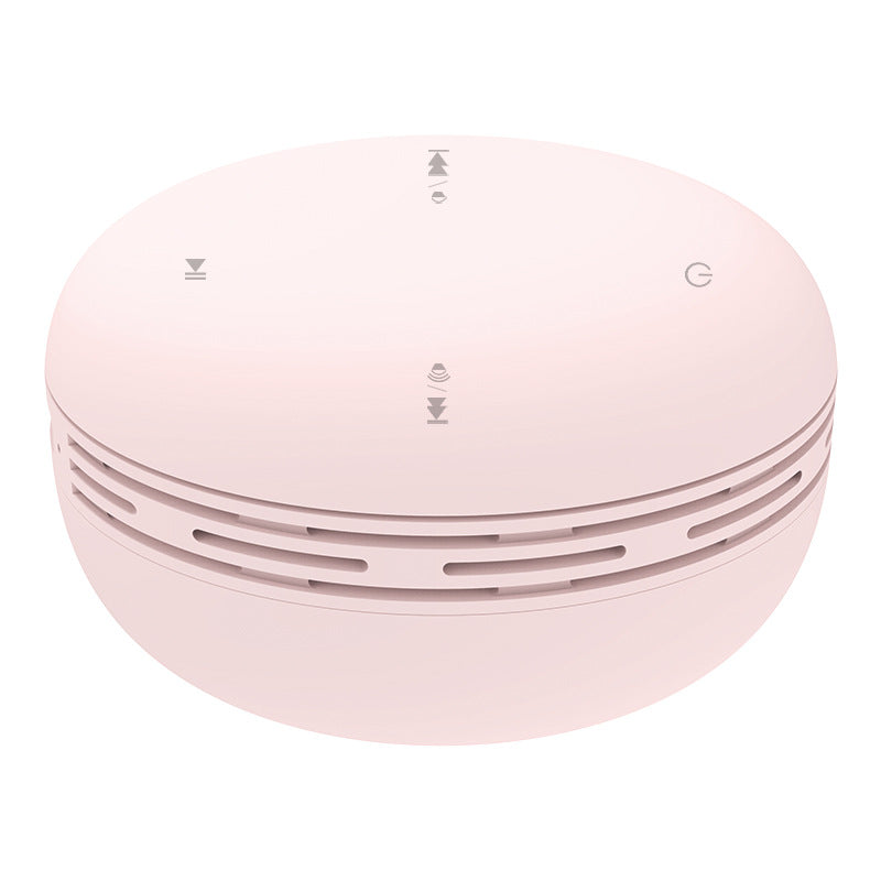 Mini Bluetooth speaker, light pink round design with vented side ring and top control icons