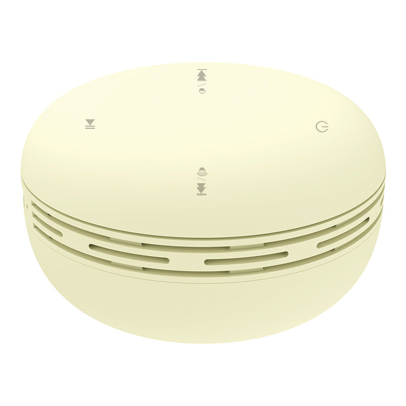 Mini Bluetooth speaker, light yellow round design with vented side ring and top control icons