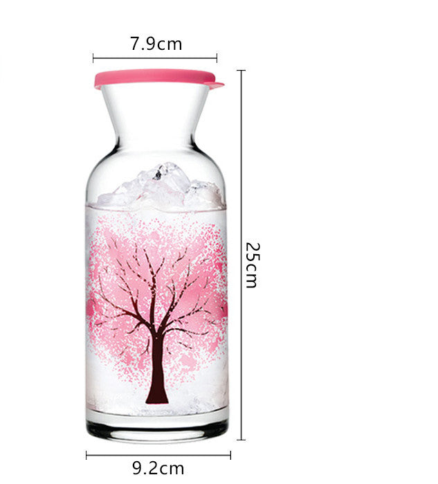 Glass water bottle with pink tree decoration and red rim, 25cm height