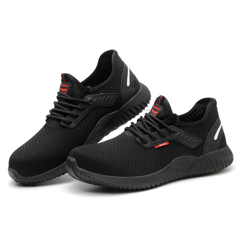 Two black breathable safety shoes with lace-up uppers and grippy rubber soles