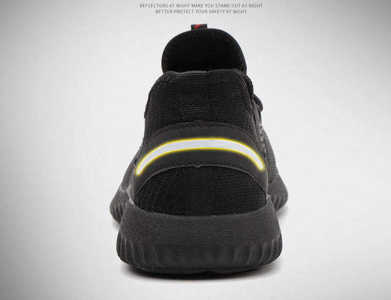 Black safety work shoes shown from heel with cushioned back and lace closure