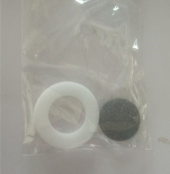 Sandpaper sanding discs in clear plastic bag, one light ring and one dark pad