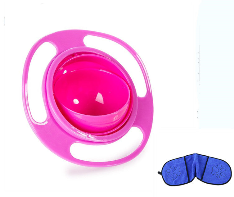 Rotating spill-proof bowl with pink outer ring and magenta inner bowl