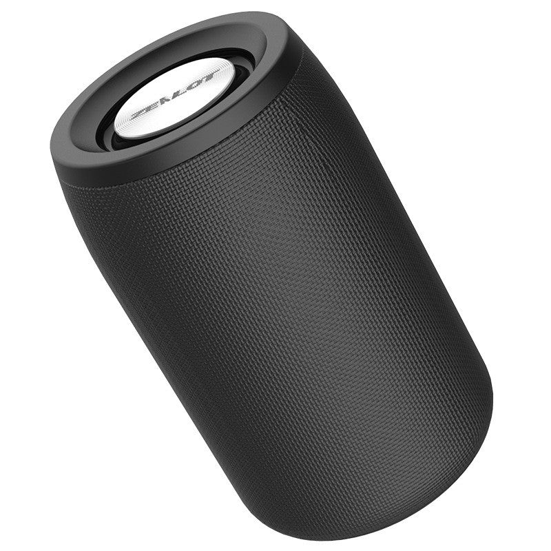 Black wireless Bluetooth mini speaker with top grille and oval logo