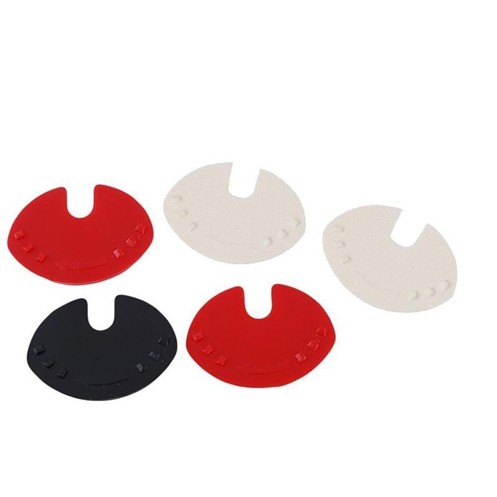 Set of animal-shaped can sealers in red, white, and black