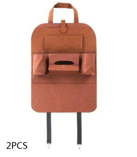 Brown back-of-seat organizer with front divider, handle, and hanging straps