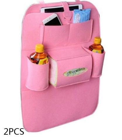 Pink car seat organizer bag with two bottle sleeves and a center front pocket