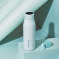 White vacuum flask with temperature display, stainless steel thermos bottle