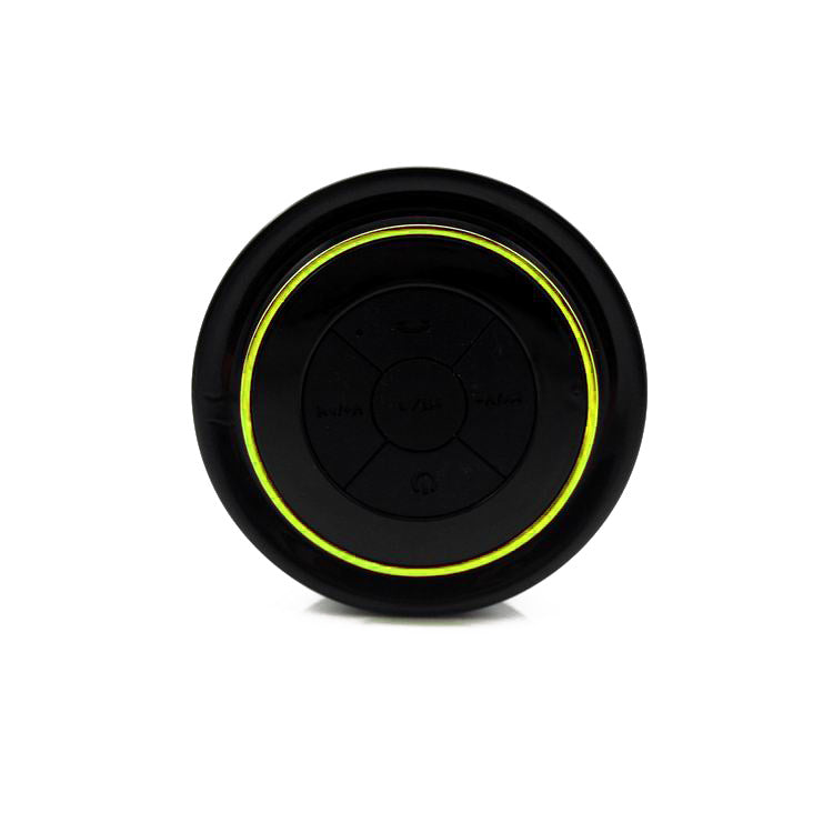 Portable Bluetooth speaker, black body with yellow-green LED ring and circular control panel