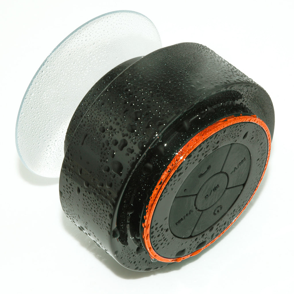 Portable Bluetooth speaker, black body with orange LED ring and circular control panel