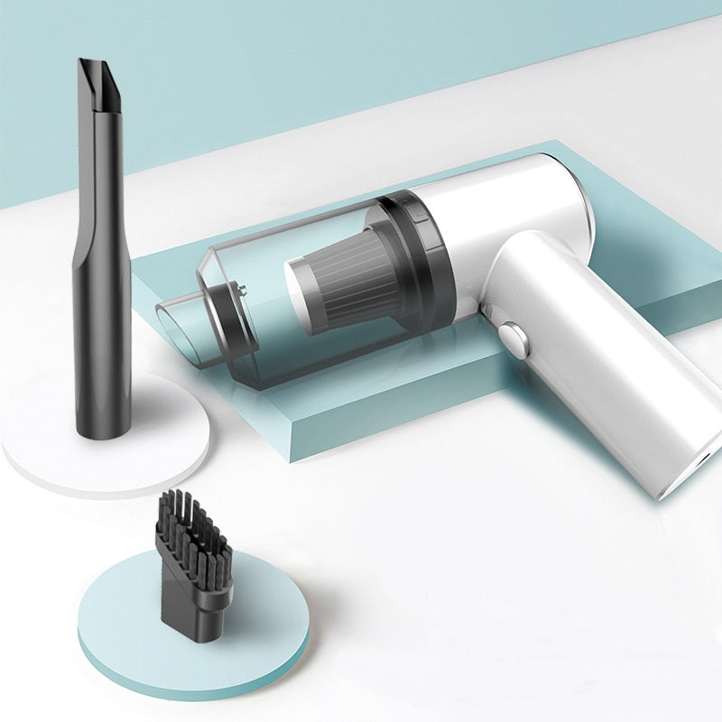 Wireless car vacuum cleaner set with white handheld unit, charging base, and brush.