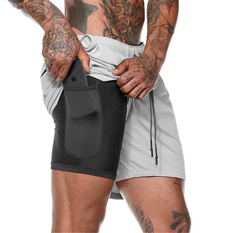 Gray pocket compression shorts with front side pocket and drawstring waistband