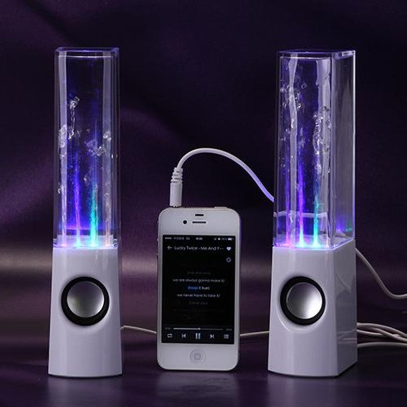 Water fountain LED speaker with clear tube, blue-purple glow, white base and round woofer