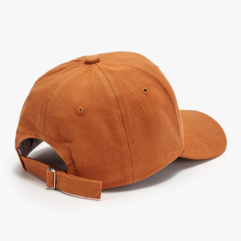 Orange baseball cap with adjustable strap on back