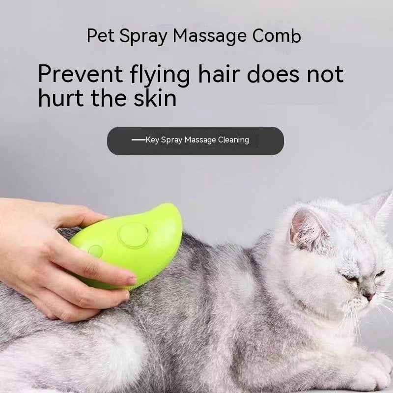 Pet spray massage comb, green, in hand while grooming a gray-and-white cat.