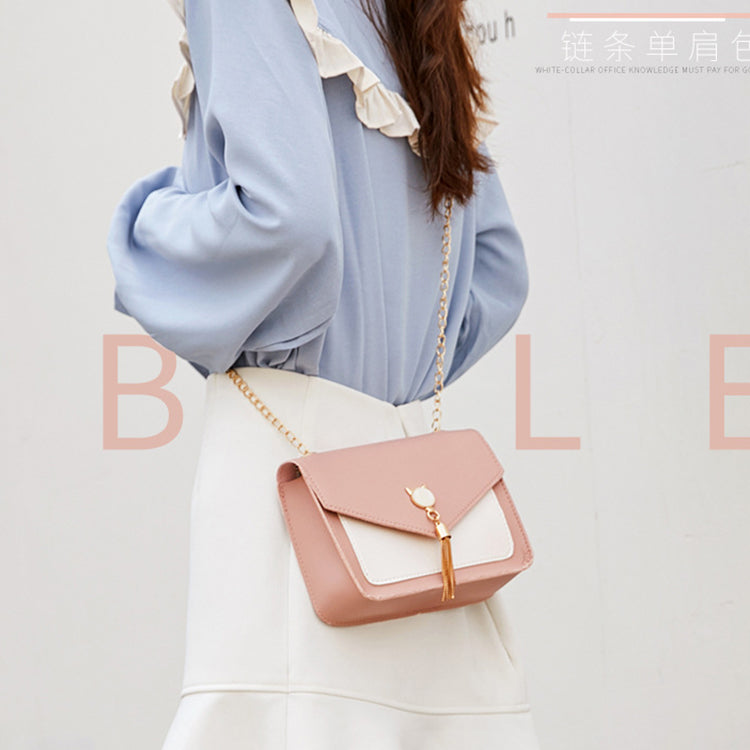 Small messenger bag, pink with white panel, cat charm clasp, gold chain crossbody