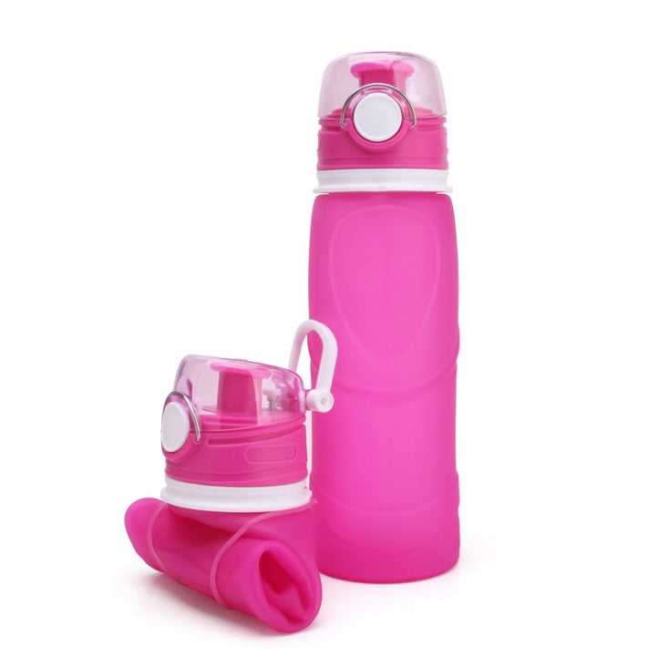 Pink folding silicone water bottle with flip-top lid and collapsible base cup