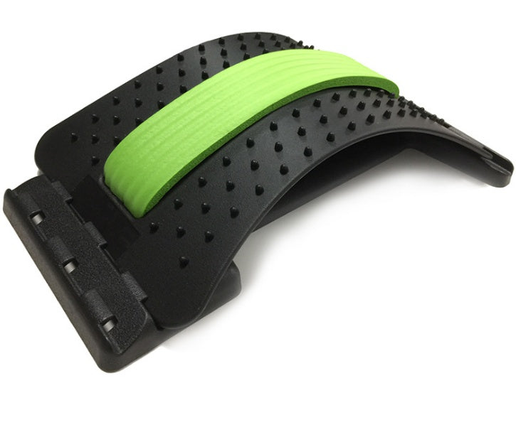 Lumbar traction waist brace with green support strap and black dotted cushion pads