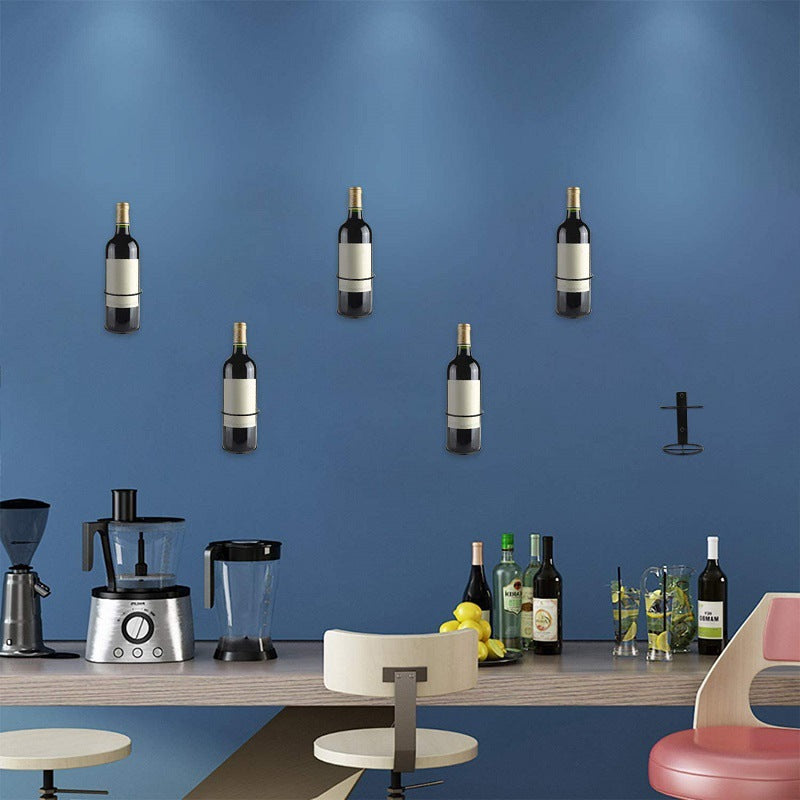 Black wall-mounted wine rack with oval bottle holder for one bottle