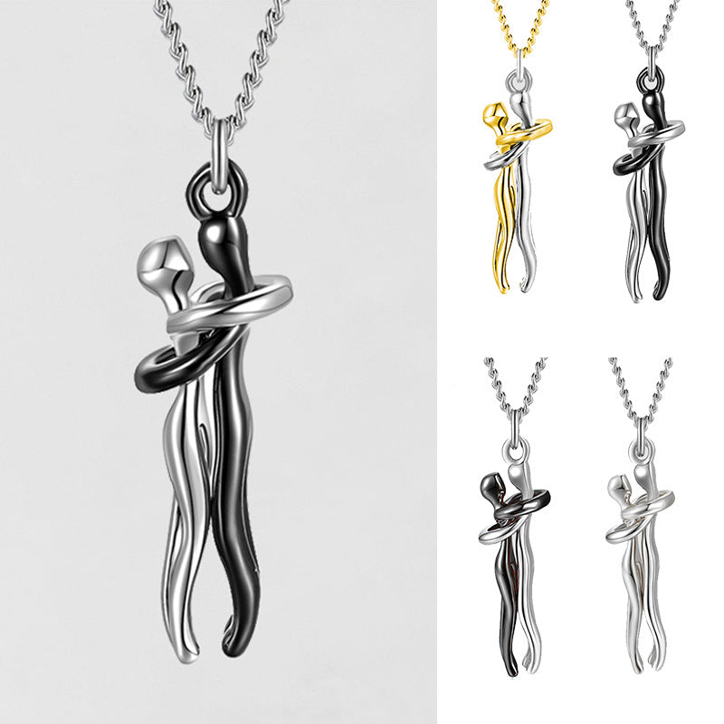 Love hug necklace with silver chain and two-tone hugging couple pendant