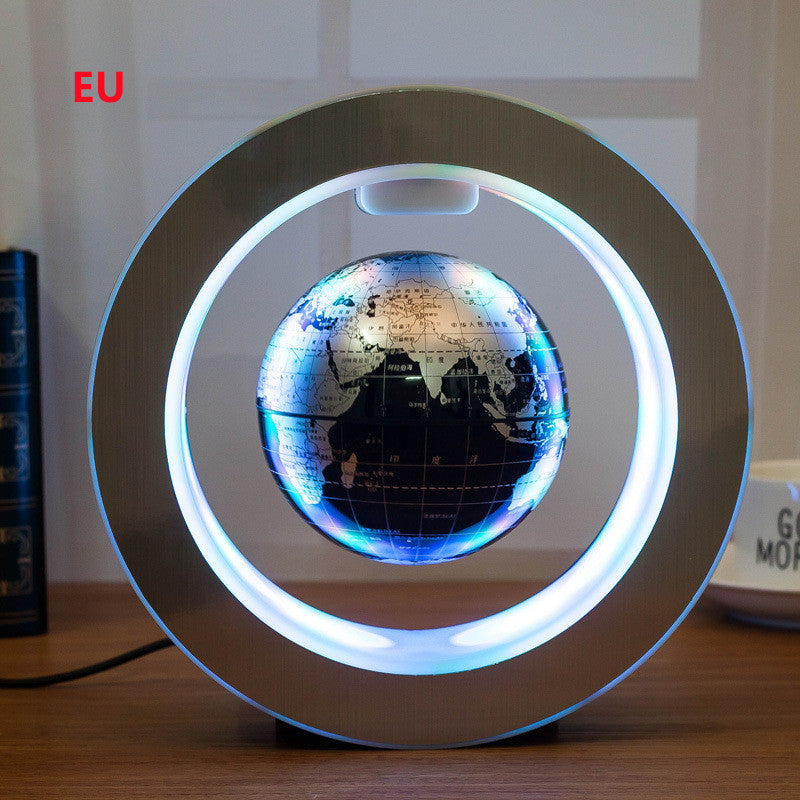 Floating LED world globe with white lit ring and dark-toned globe map on dark base