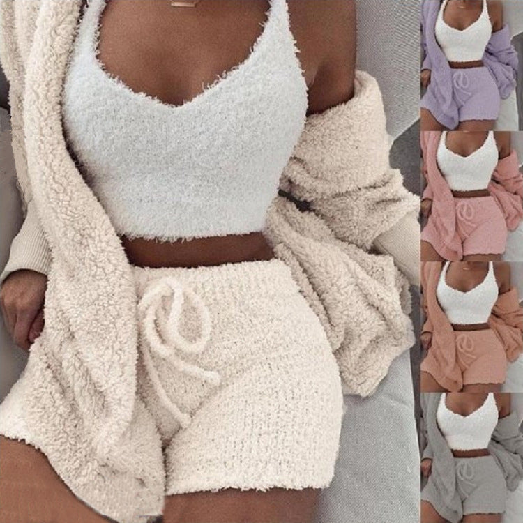 White fuzzy pajama set: cropped tank top, drawstring shorts, long-sleeve cardigan