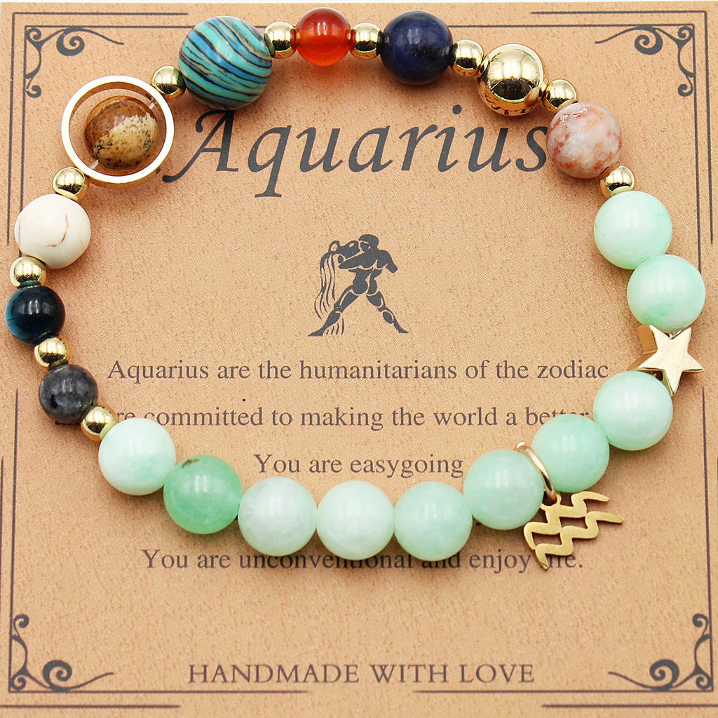 Beaded zodiac bracelet with mint green beads, gold spacers, star charm and gold charm piece