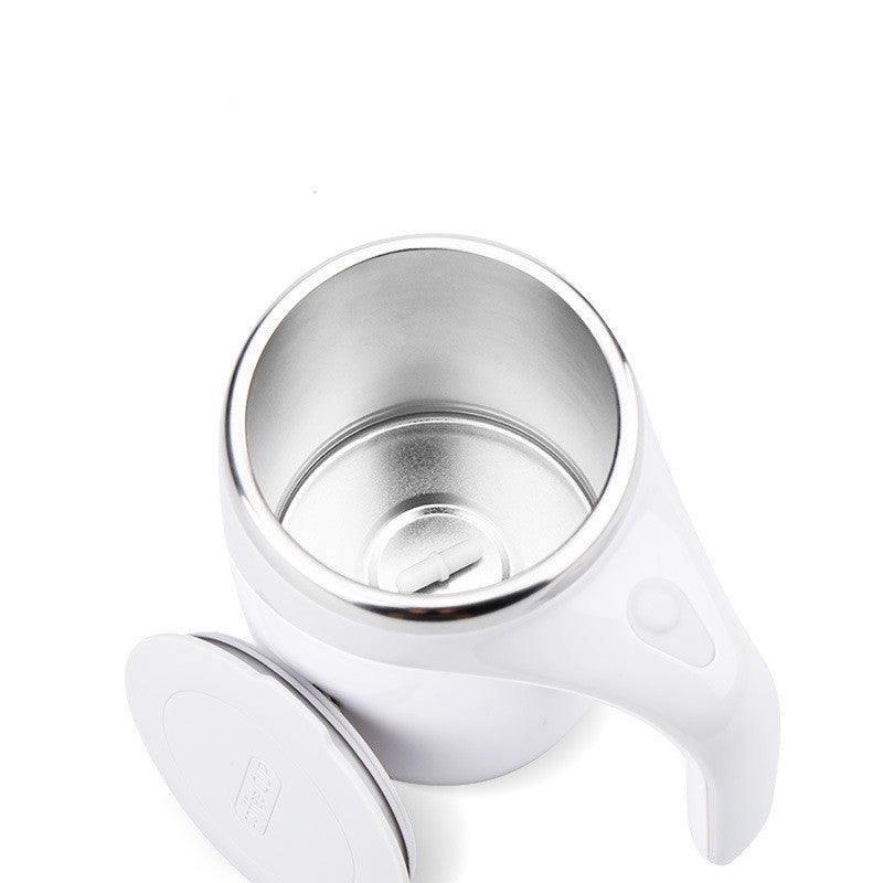 White electric stirring cup base with exposed inner bowl and mixing paddle